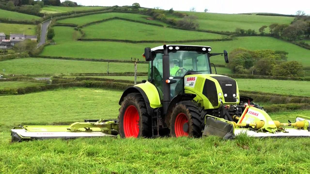 Mowing for Silage with Claas Axion 820 and Claas Triples.