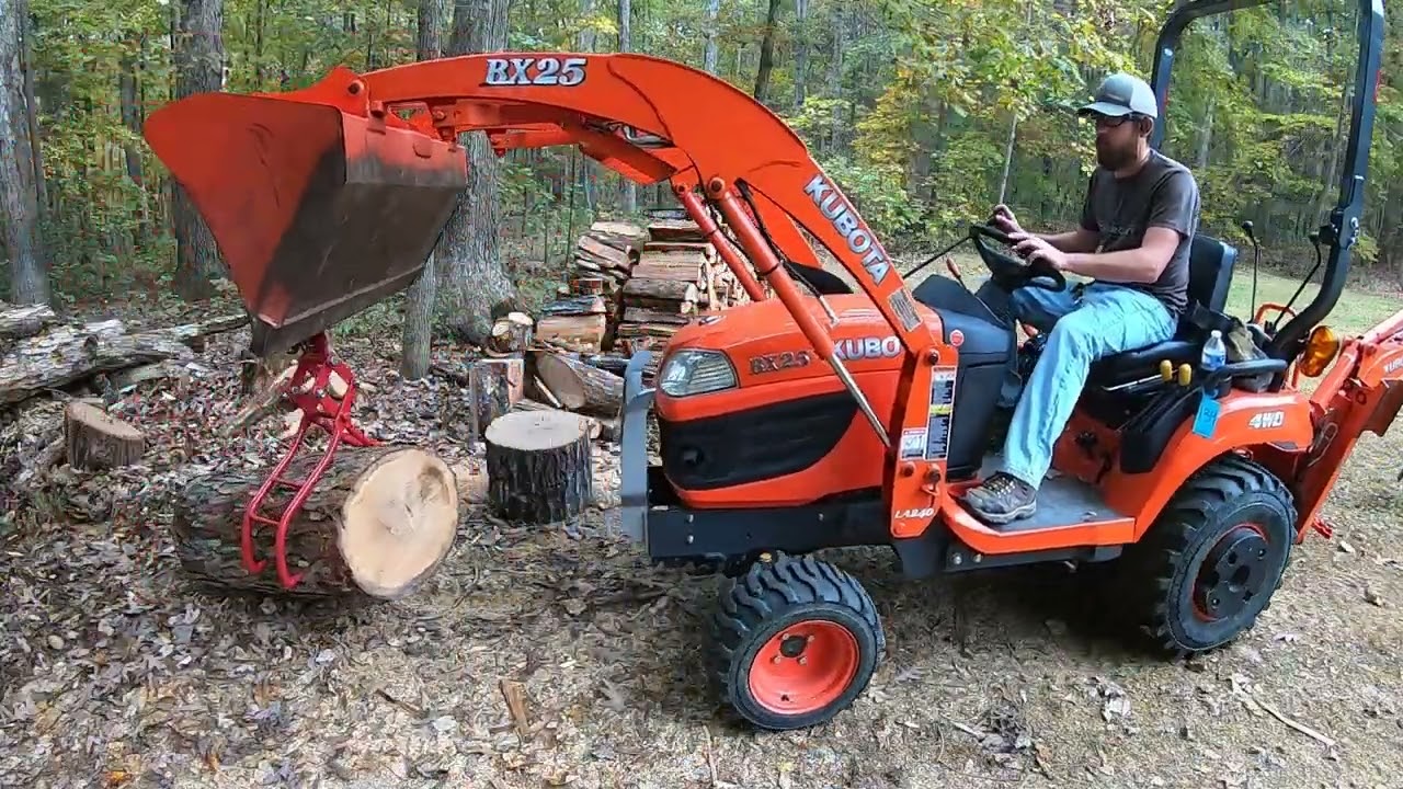 kubota bx testing out log lifting tongs