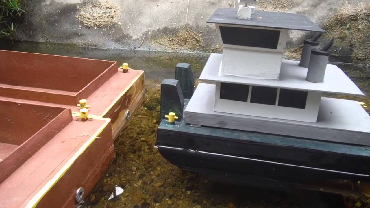 Barge and Tow Boat Remote Coupling System