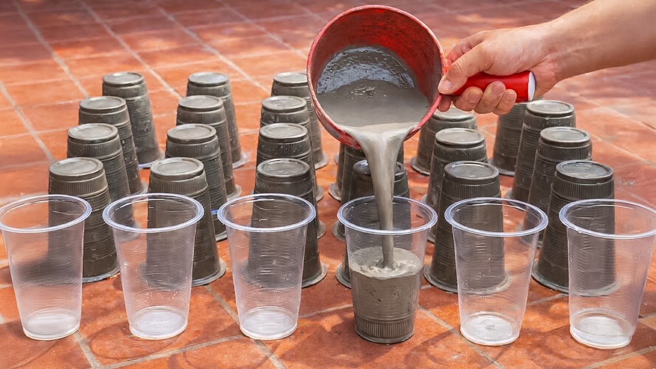 Pour cement into the plastic cups. A million-dollar masterpiece that anyone can make.