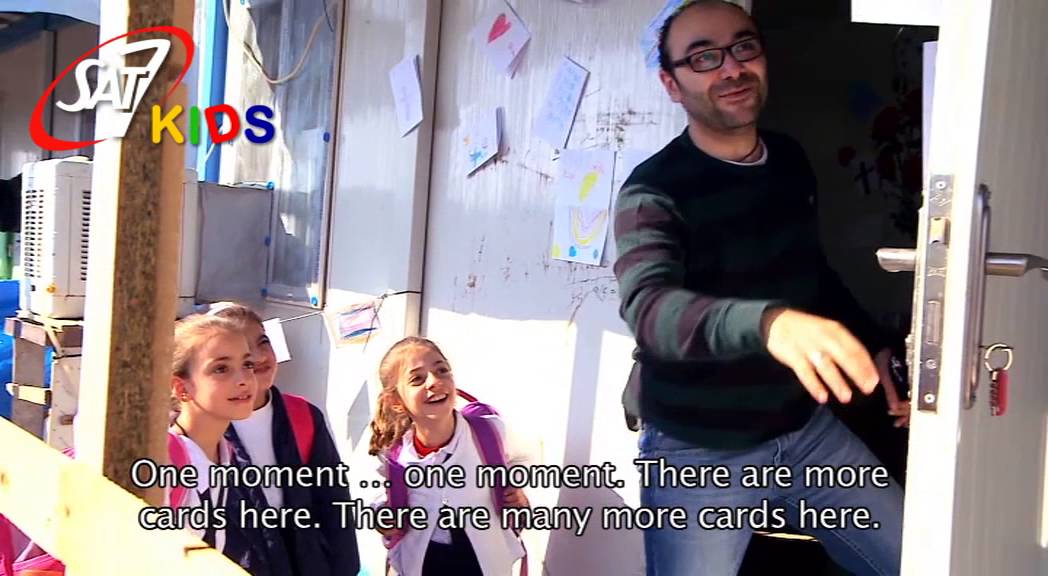 SAT-7 KIDS Myriam and Sandra See Cards on Caravan