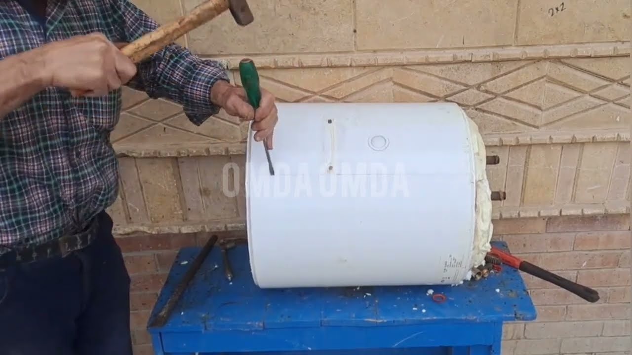 فك سخان كهرباء تالف واعادة تجديده