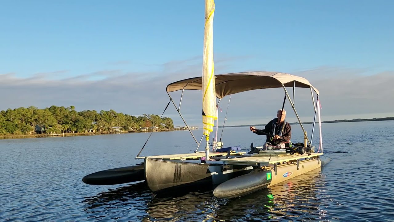 18 lb thrust electric motor on an Expandacraft 16 ft Two Sided Canoe Outrigger Kit - Black and Tan.