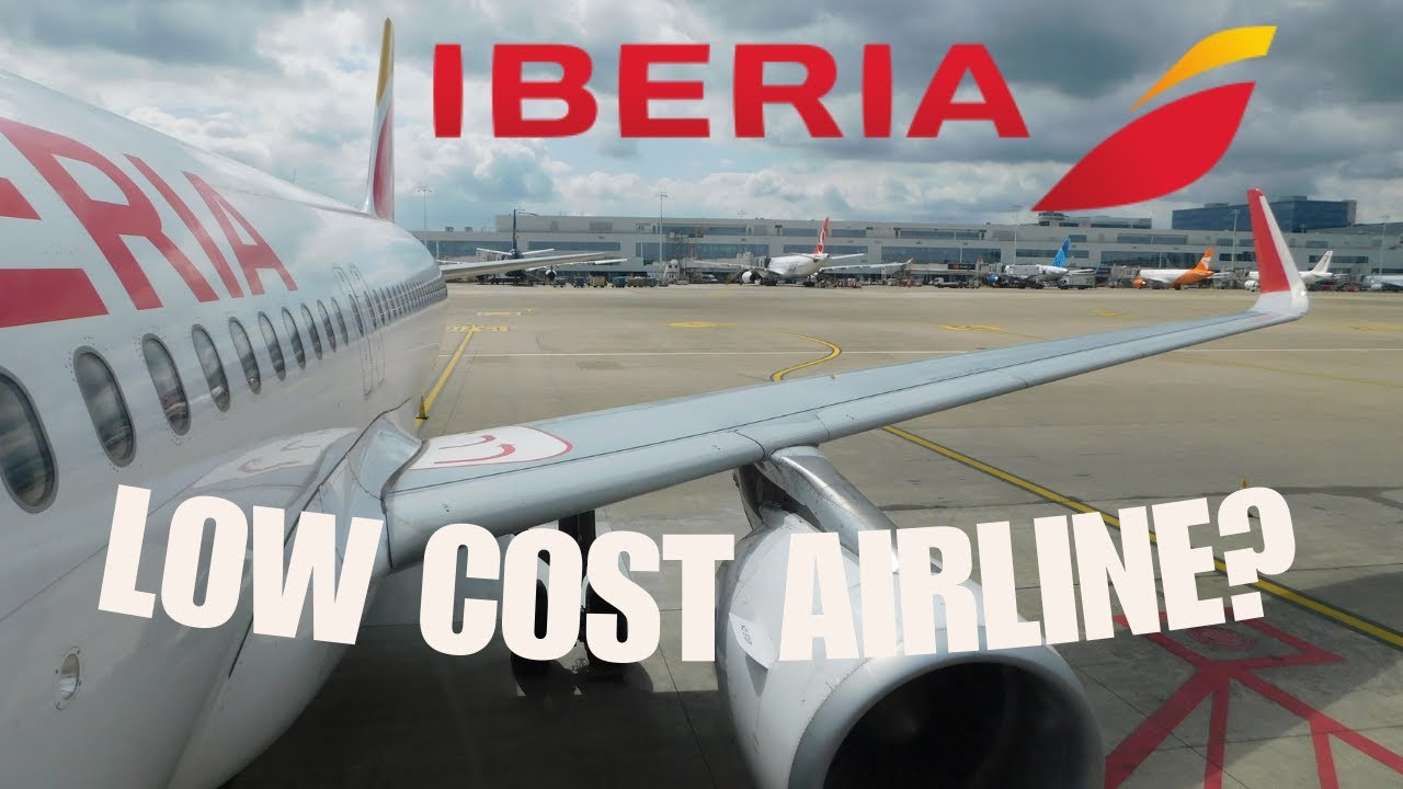 LOW COST AIRLINE? Iberia Airbus A320 steep departure from Brussels