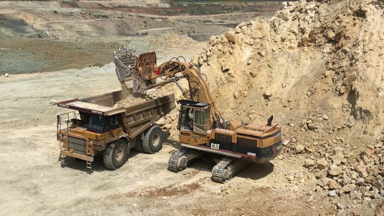 Caterpillar 5090B Shovel Excavator Loading Caterpillar Dumpers - Sotiriadis Brothers