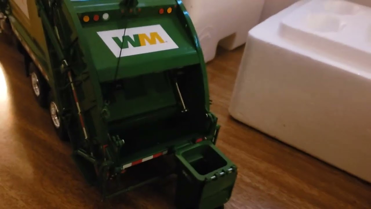 Unboxing my brand new First Gear WM Freightliner Mcneilus rear loader garbage truck.