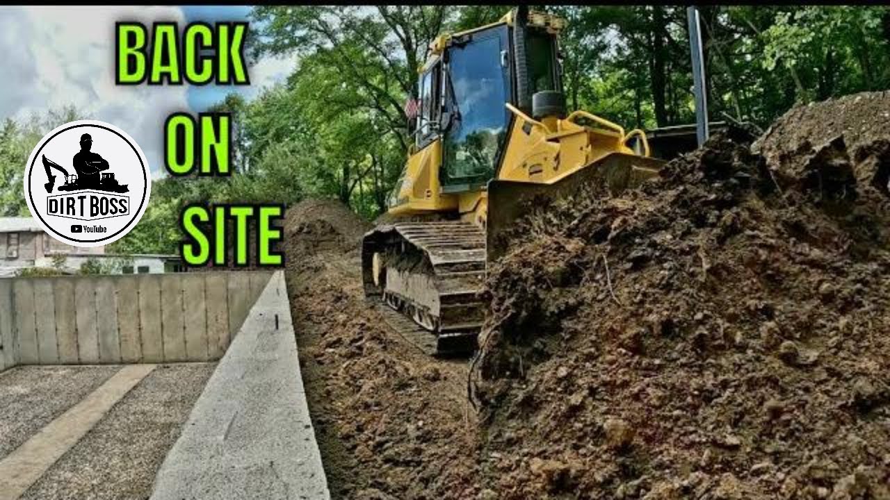 Komatsu D51 Backfilling a house foundation