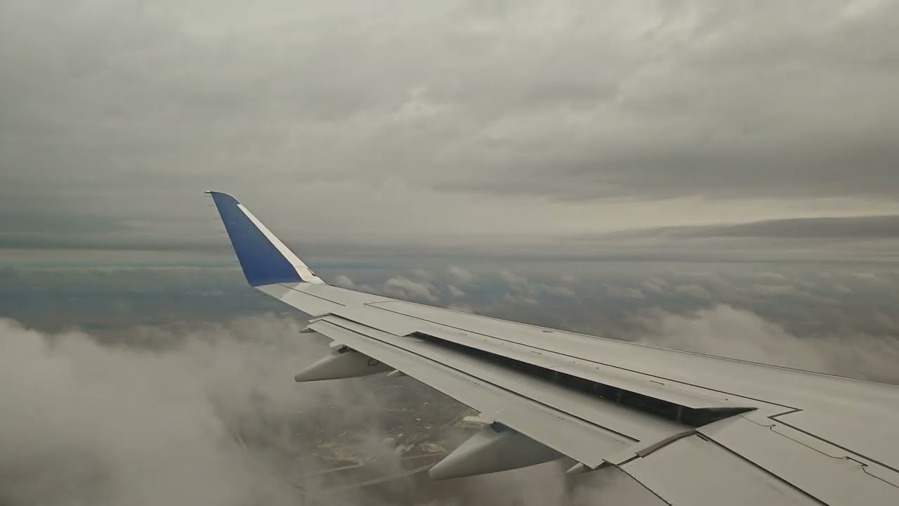 4K Flying Over, landing, taxiing at Austin-Bergstrom International Airport Overcast Day 2026 March 7