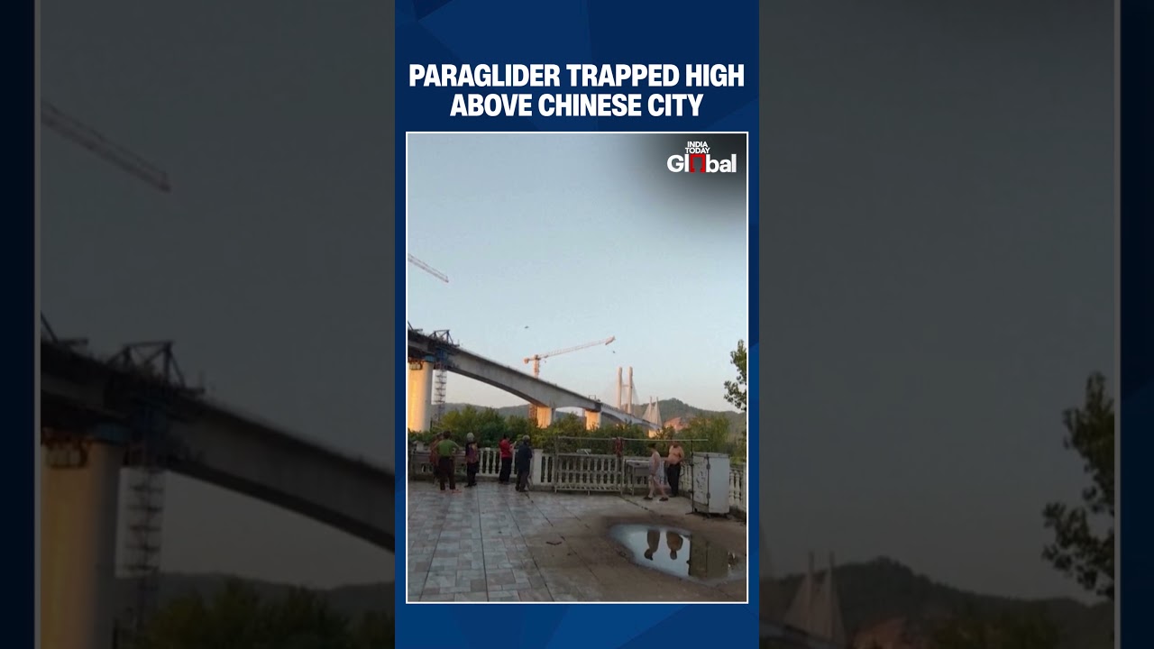 Paraglider Rescued After Getting Stuck on Tower Crane High Above China's Sichuan Province | #china
