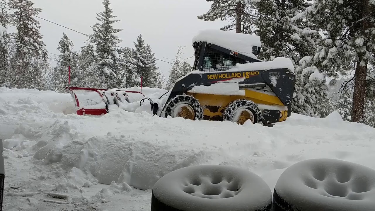 Plowing my driveway with the skid steer