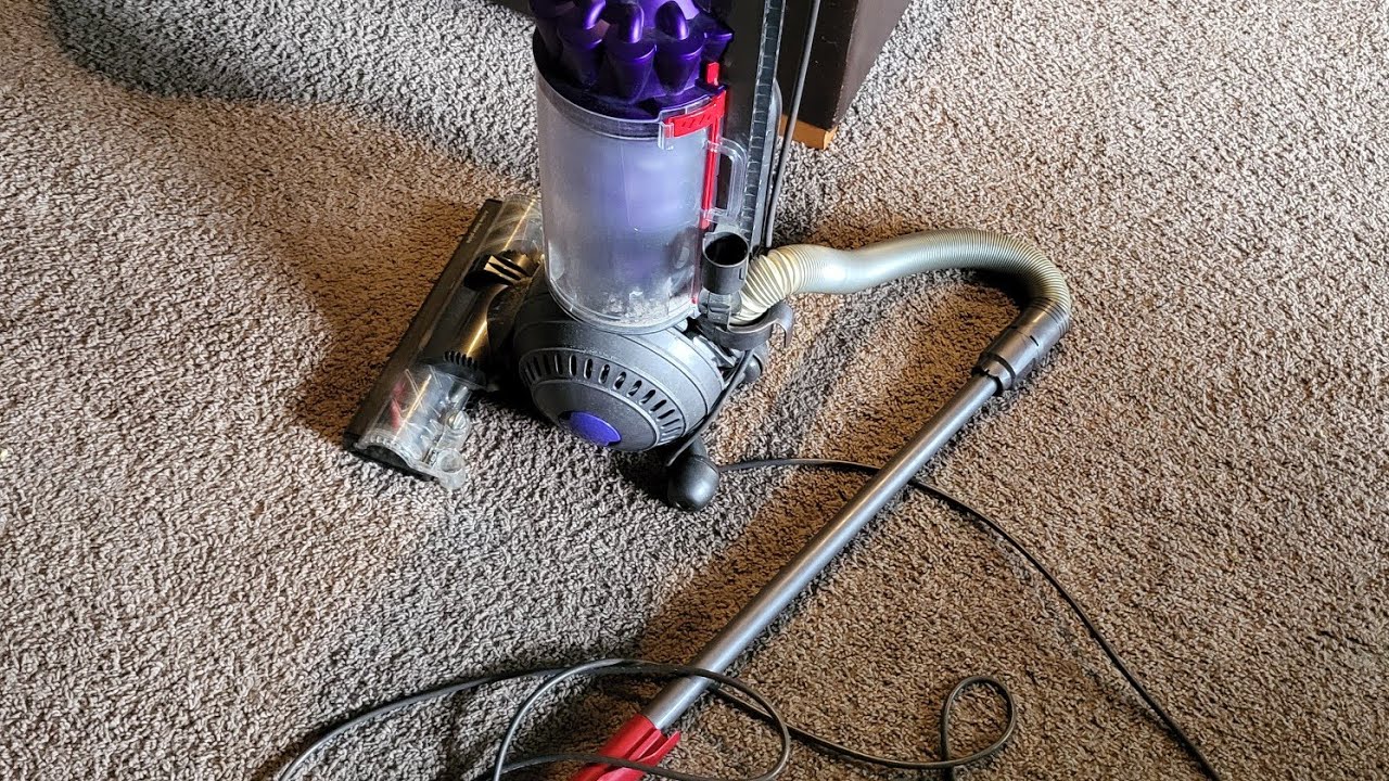 Как получить доступ к отсоединению шланга пылесоса Dyson DC41