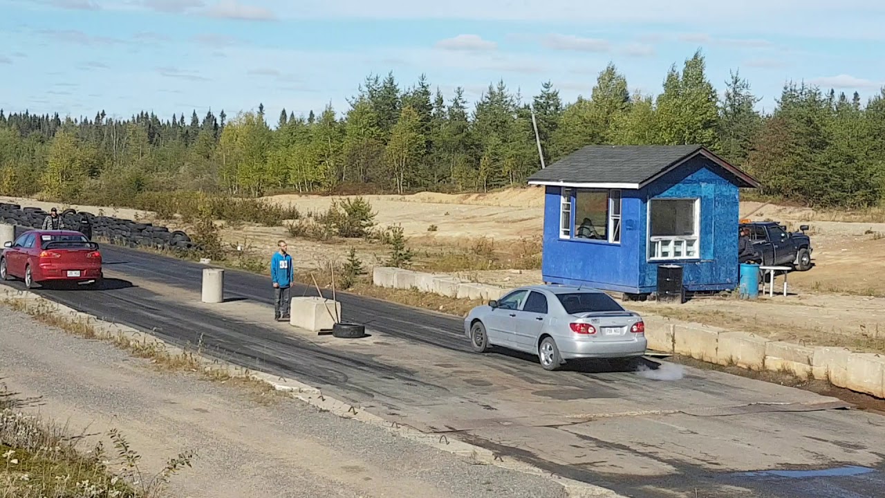 lancer 2009 vs corolla 2005 heads up