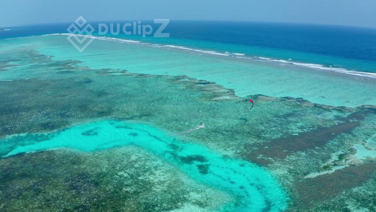Aerial View of Maldives Island with Crystal Clear Blue Waters