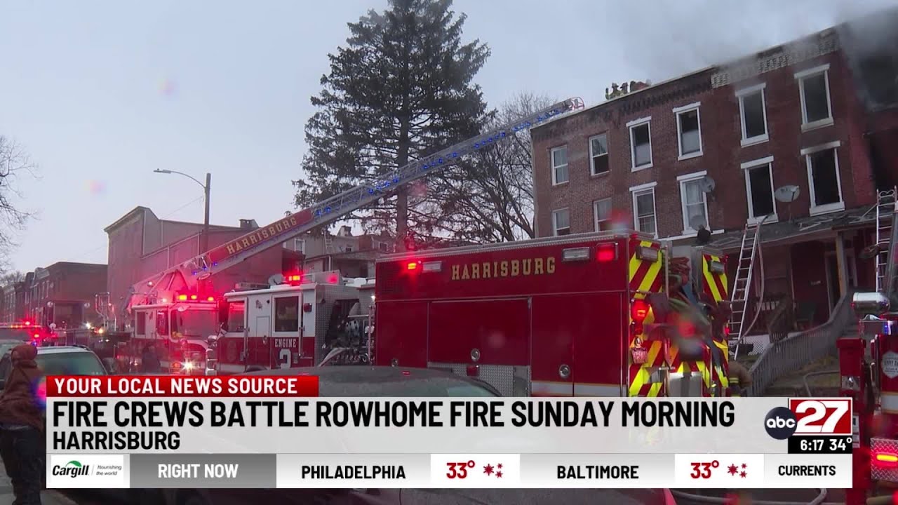 Fire crews battle Harrisburg row home fire