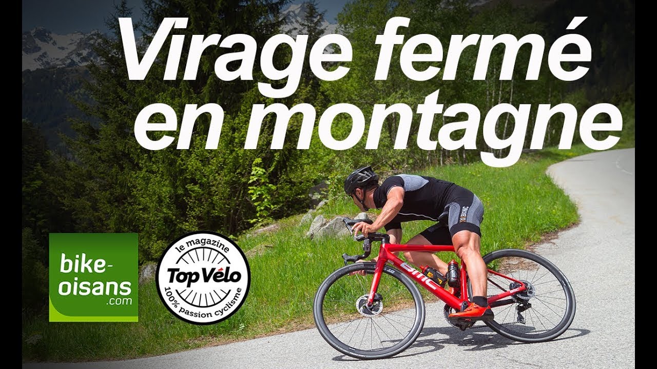 Descente à vélo : Prendre un virage fermé sur mauvais asphalte en montagne