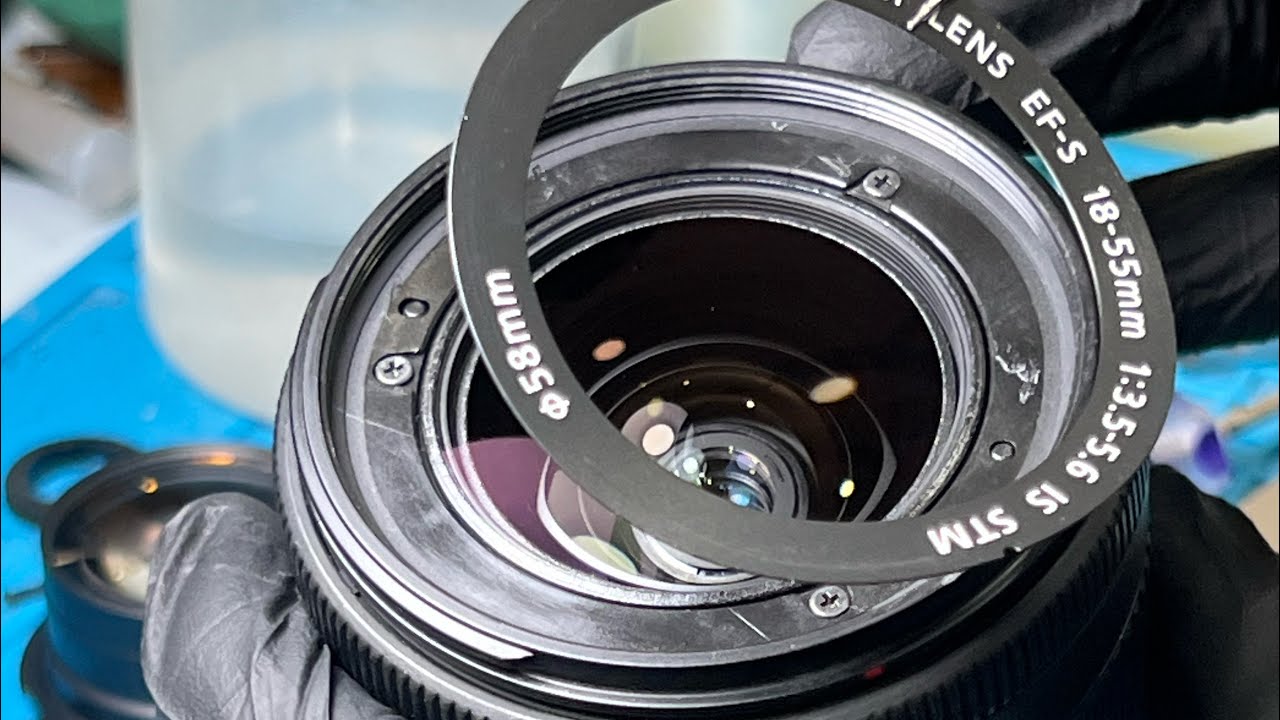 vệ sinh canon 18-55 stm bị mốc