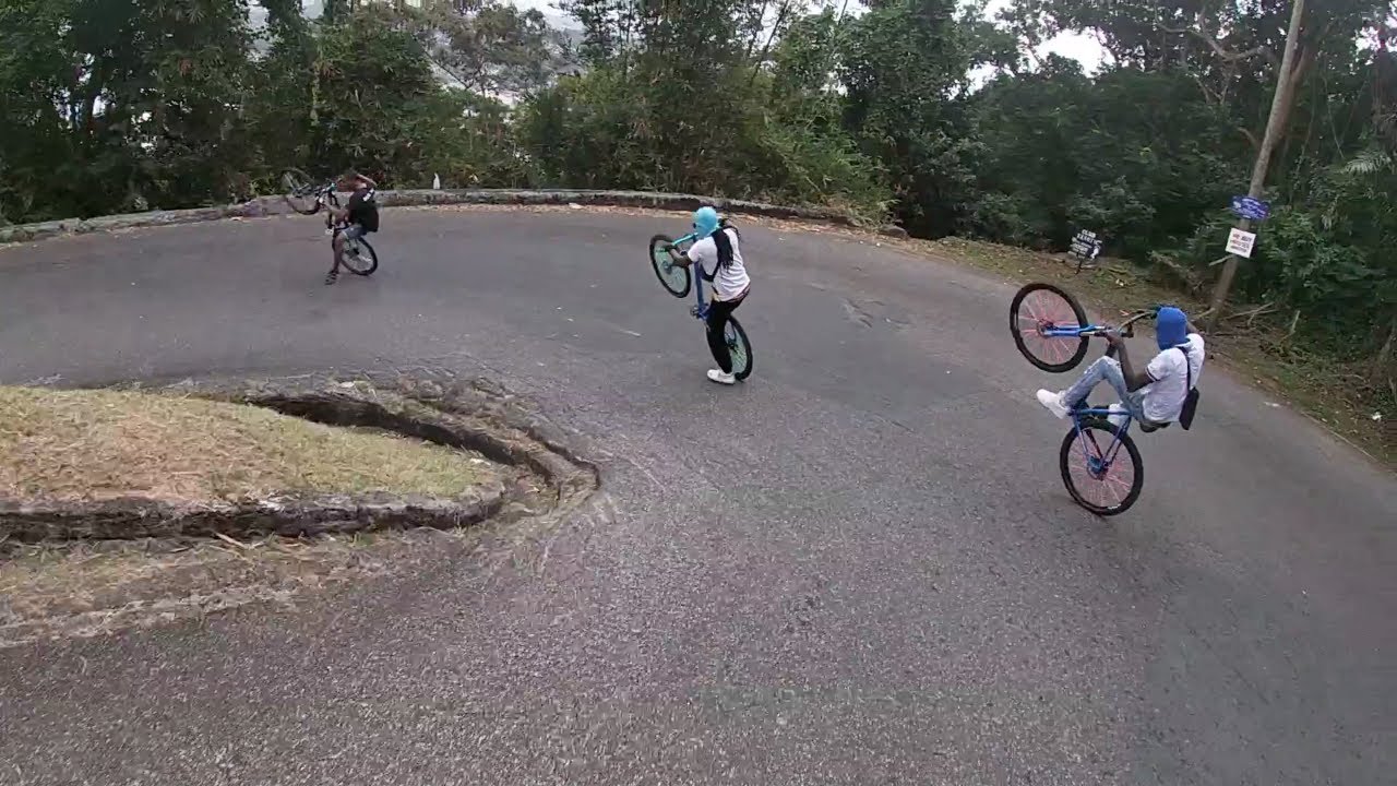 Wheeling down a hill with over 5 HAIRPIN bends on our way to the city | St.Lucia | 1400 BIKERS