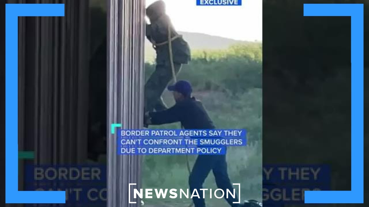 Video shows migrants climb over U.S. border wall | NewsNation