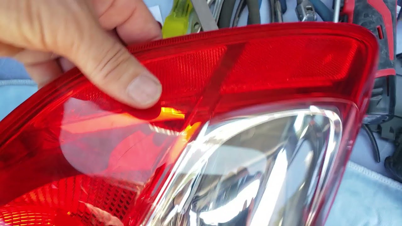 2012 Matrix, driver's rear tail light assembly removal, bulb replacement. BACKUP CAMERA