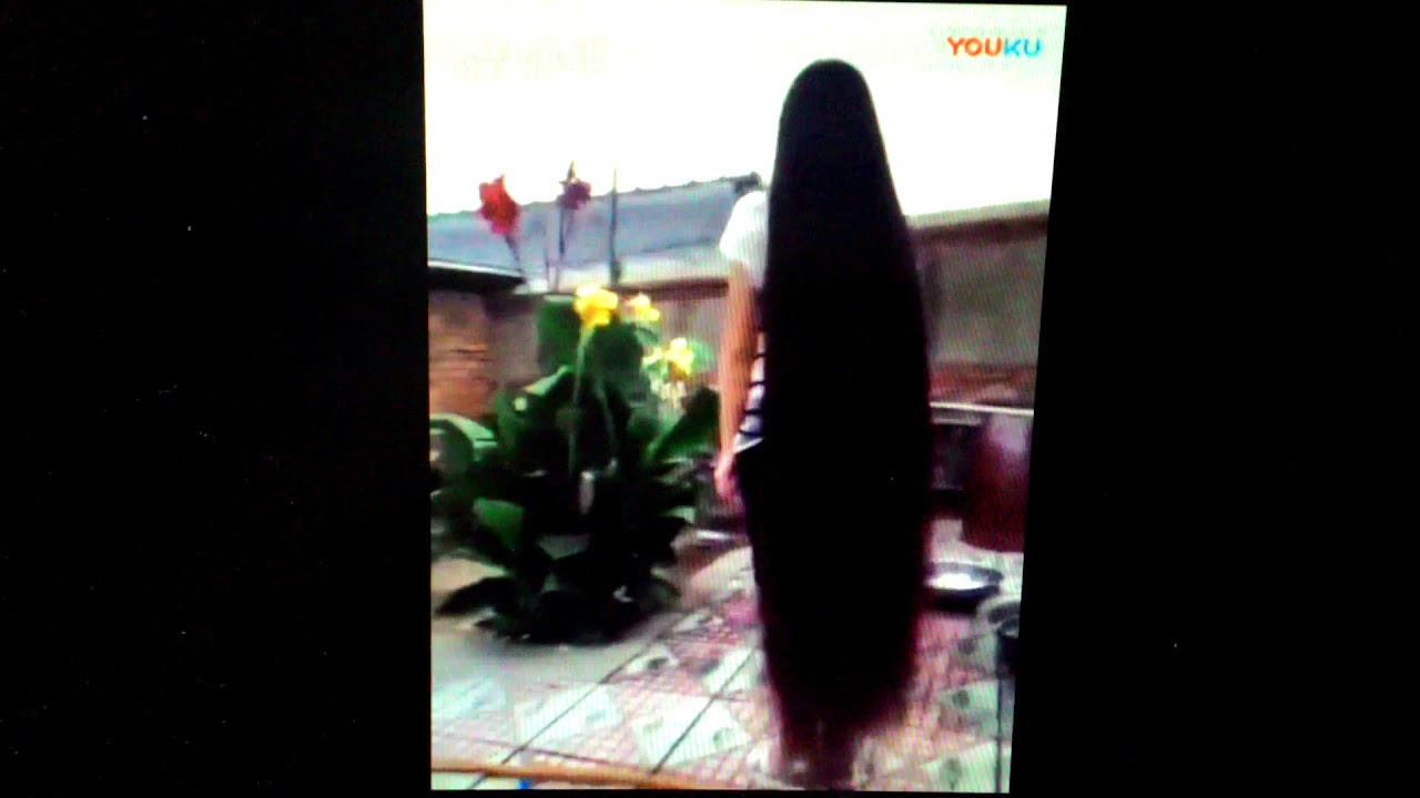 Mainlandchina young girl's floor length long hair.