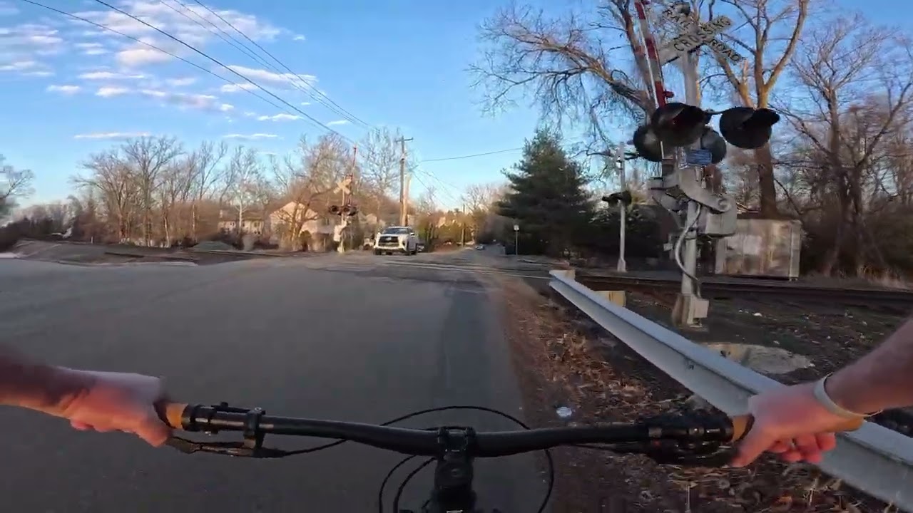 Biking Oradell Reservoir (an 80-degree sunset in March)