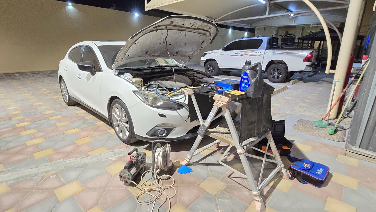 إعادة شحن غاز التبريد في المركبة بطريقة وزن كمية الغاز.....