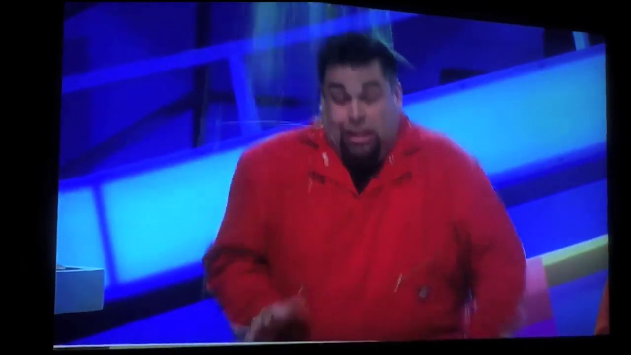 Host Kyle Serra getting slimed on Figure It Out.