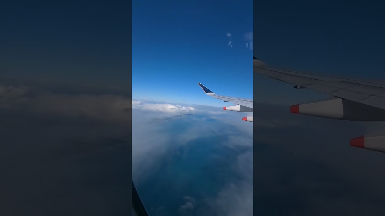 Plane #takeoff over 2 #rainbows #timelapse #dreamy #clouds
