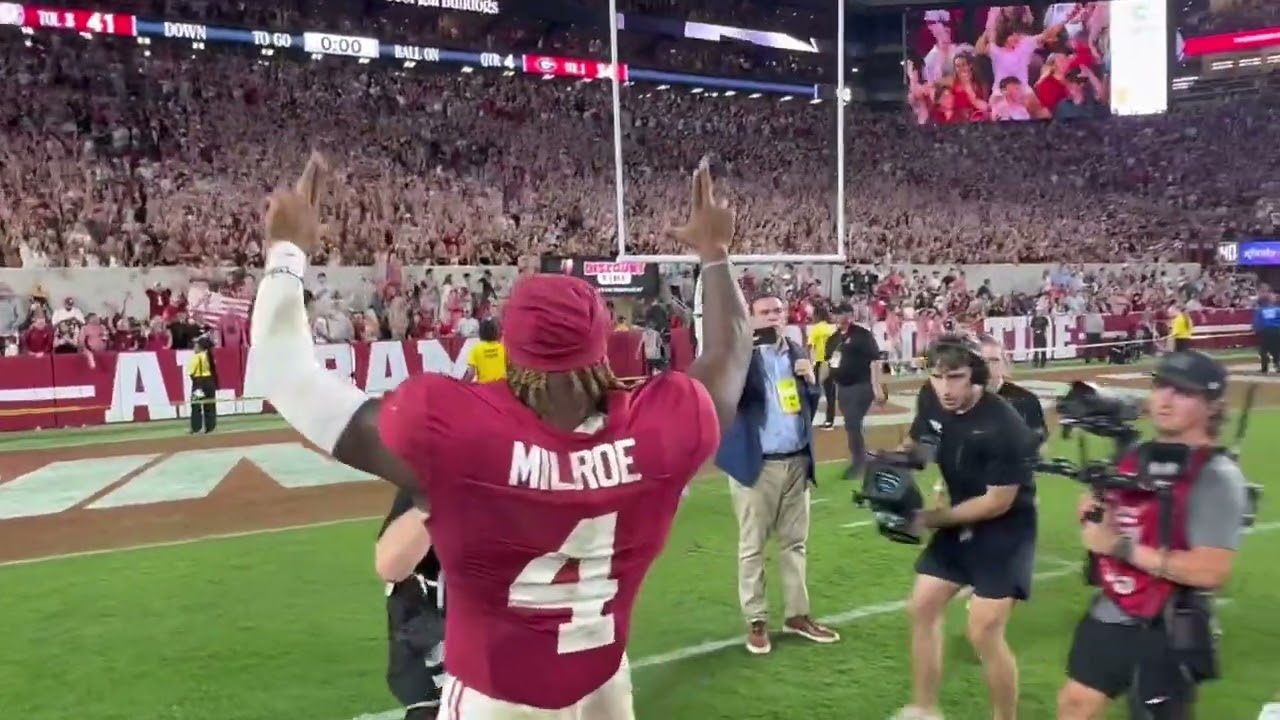 Jalen Milroe soaks in Rammer Jammer after Alabama’s thrilling win over Georgia.