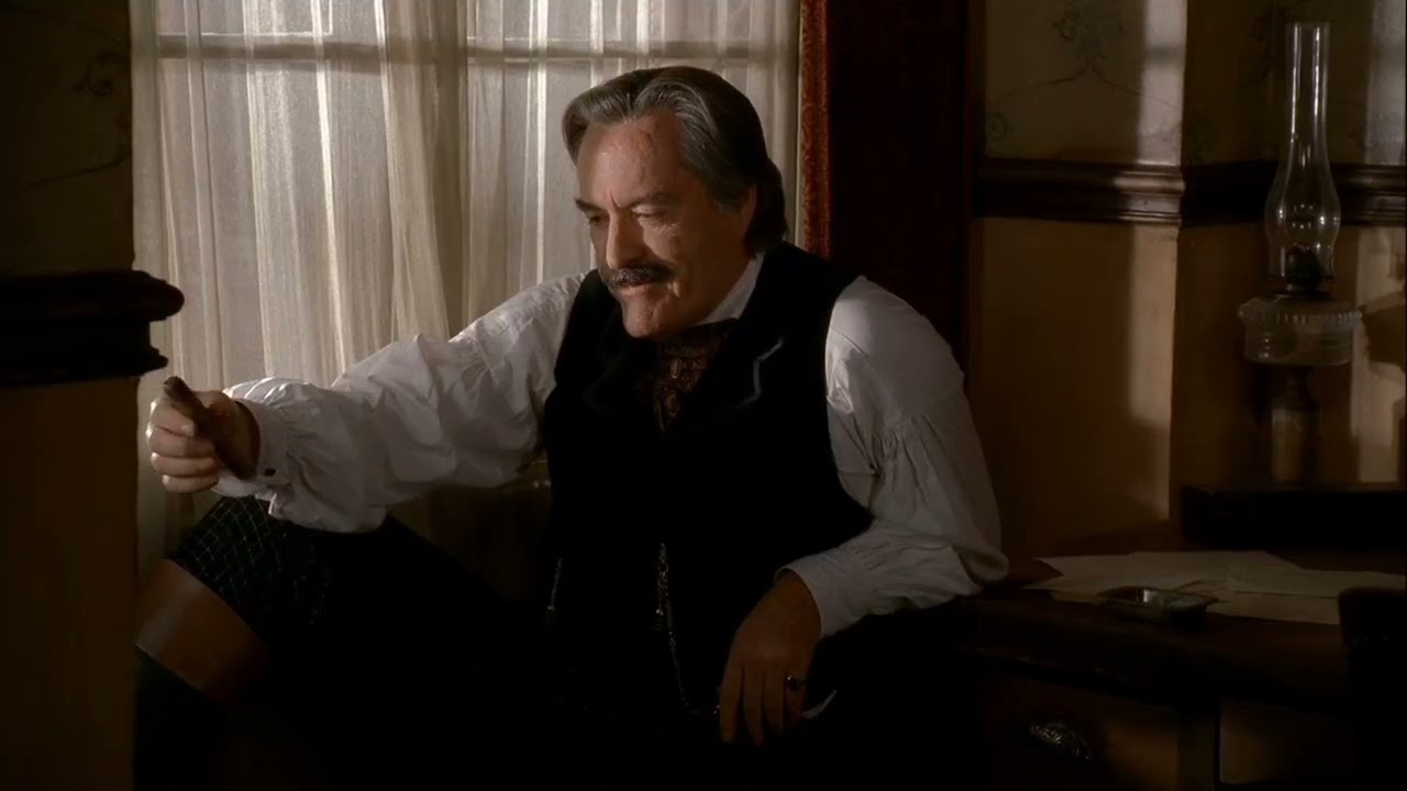 S2E7-Joanie Stubbs asks Cy Tolliver about the bodies of the girls