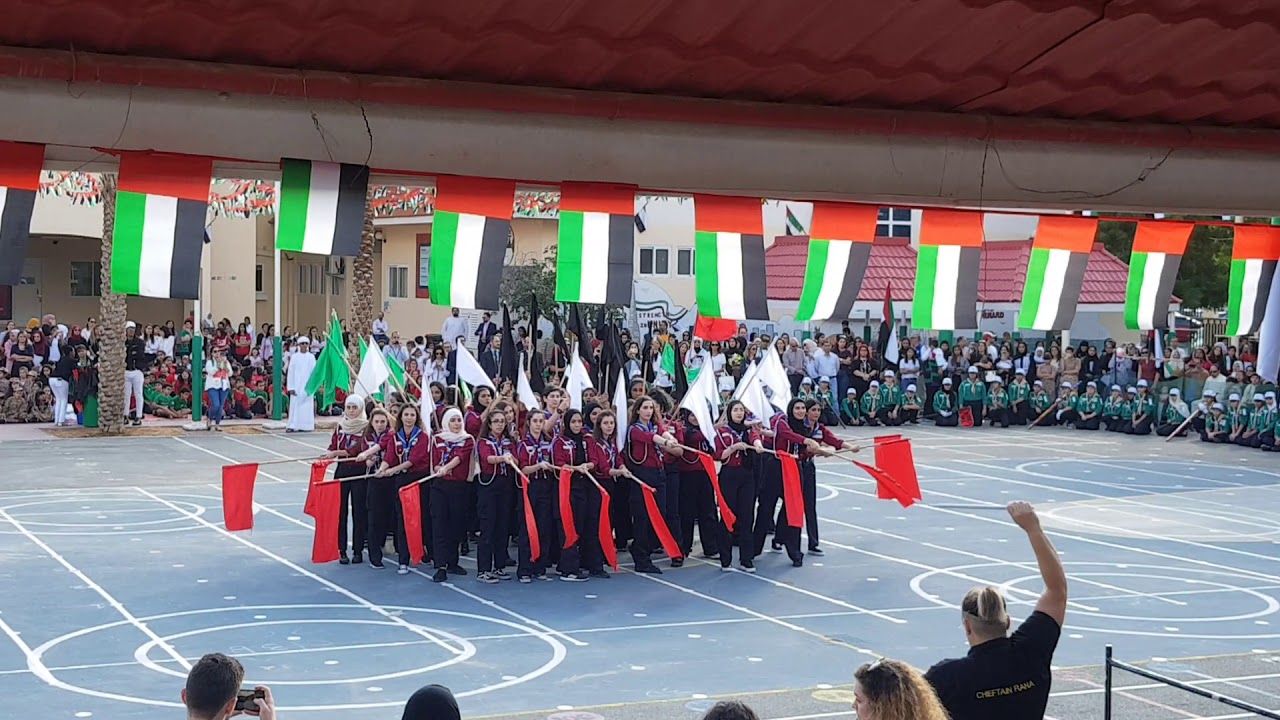 Almawakeb Girls Scouts celebrating UAE 47th national day