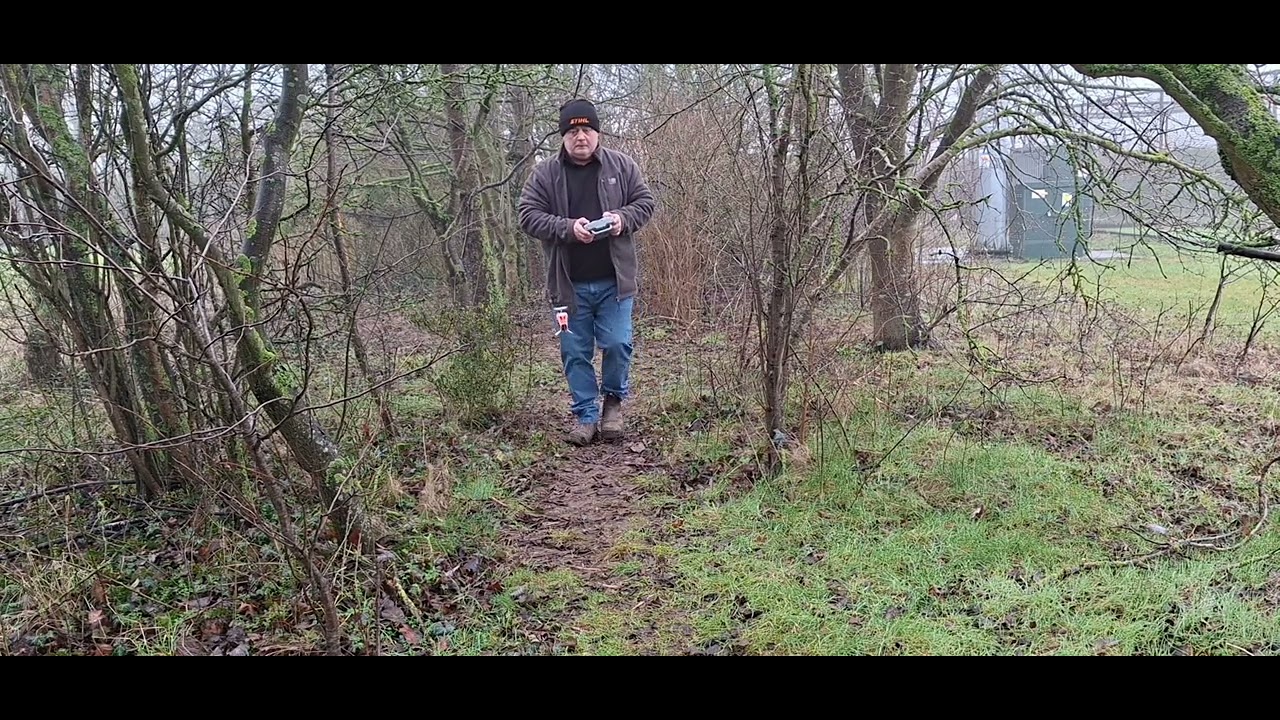 Goosky S1 in a wooded trail.