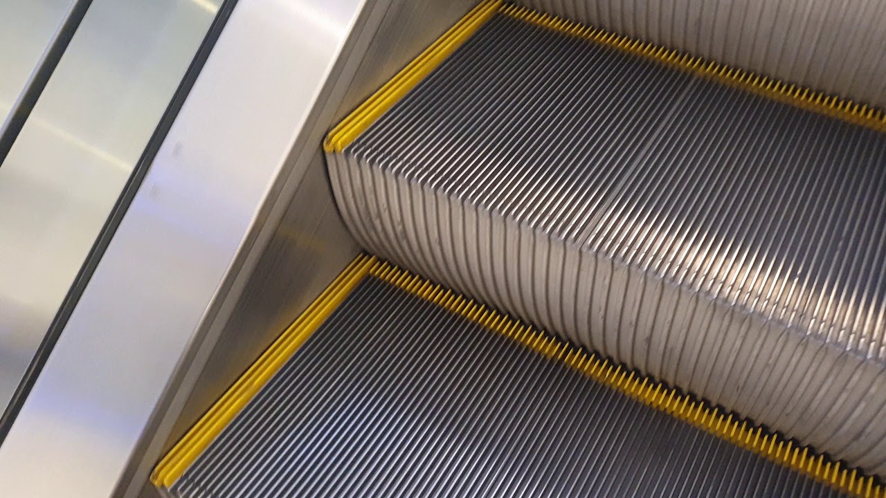OTIS Escalator with old logo
