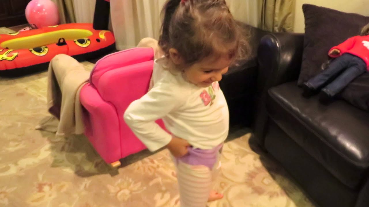 S cute 2 year old triple diaper dance puts extra diapers on herself MVI 0351
