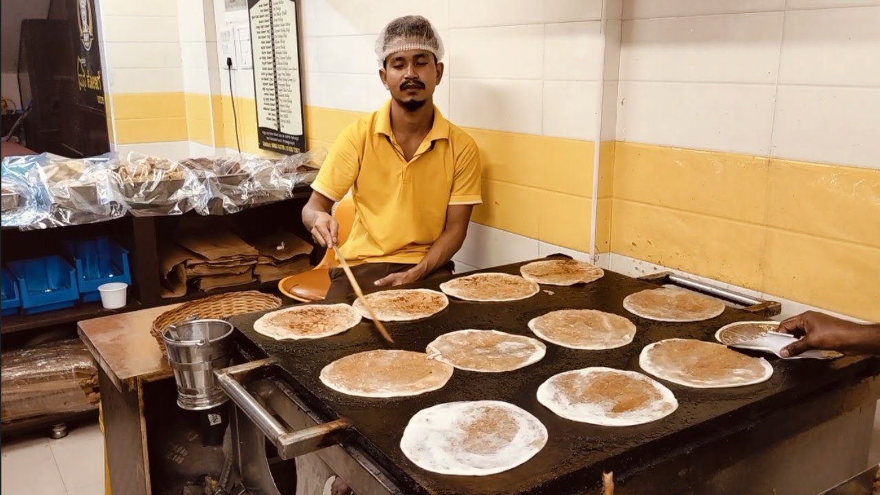 Making of Holige, a traditional south Indian sweet dish.