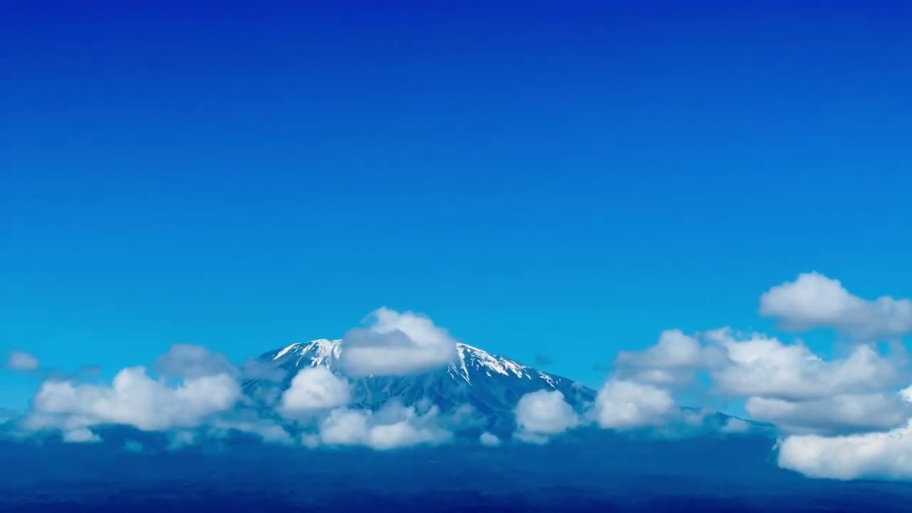 Mount Kilimanjaro, Africa's highest peak, is a dormant volcano formed by volcanic activity over mill