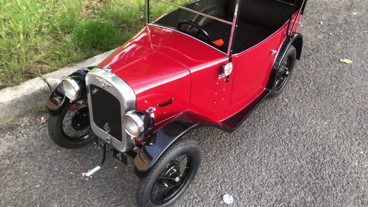 Austin J40 Austin seven and VW type 2 pickup, pedal car line up.