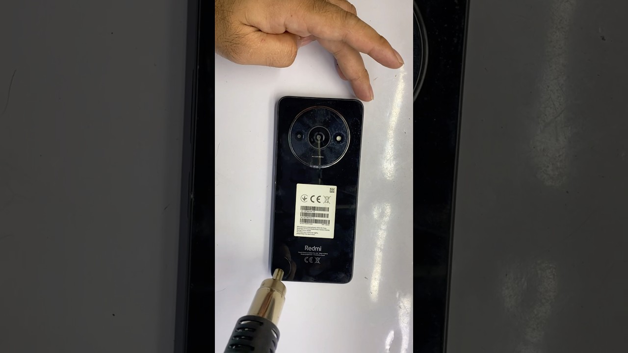 how to remove back panel redmi a3