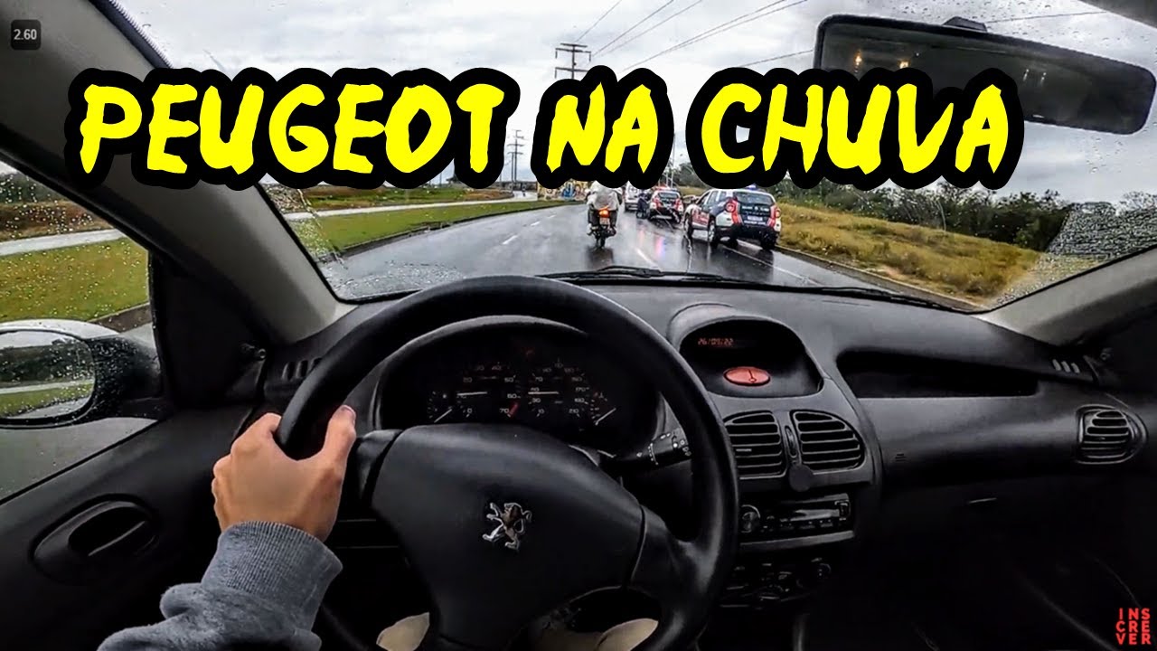 PEUGEOT 206 1.4 COMO SE COMPORTA NA CHUVA? ACELERANDO
