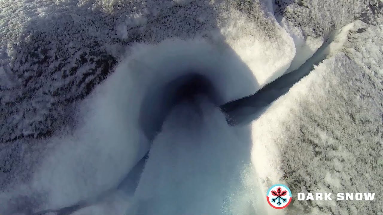 Dark Snow Greenland aerial moulin mix