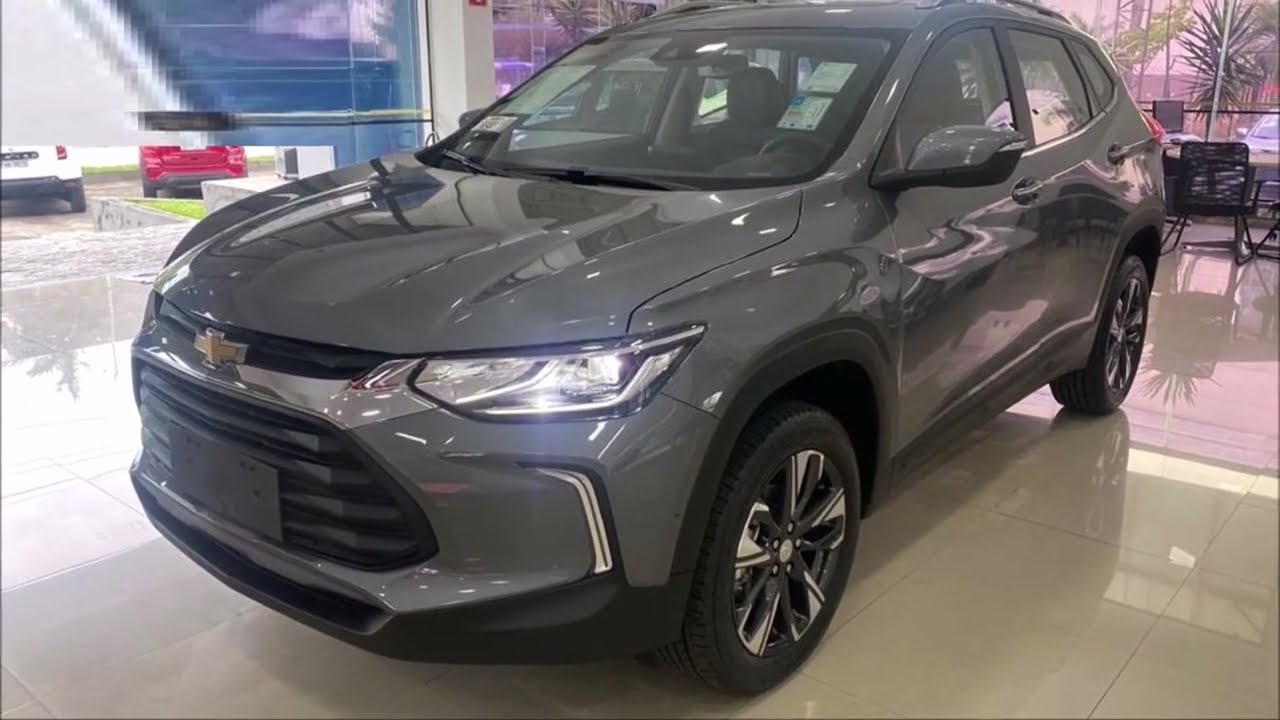 TRACKER OU KICKS 2024 NISSAN X CHEVROLET