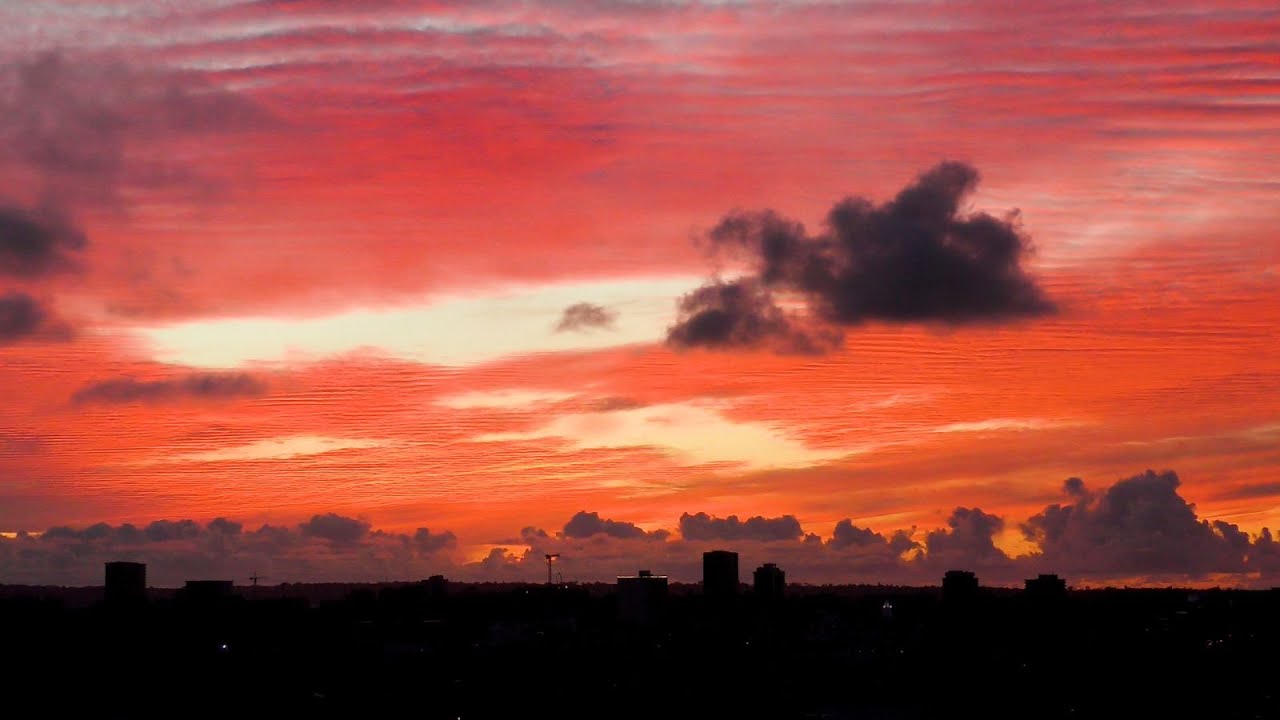 crazy clouds over San Diego at sunset in 4k
