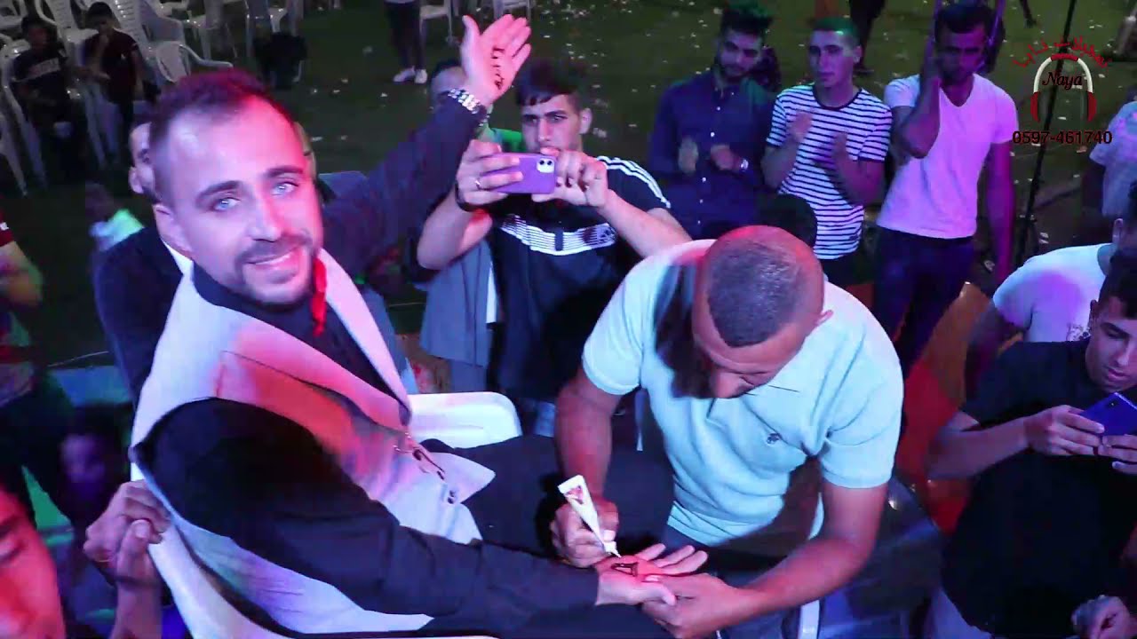 النجم حمودة حنون👈انصدم باجمل نقش حناء💯 بطريقة غريبة 😱في مهرجان محمد ابو زنيد الخليل