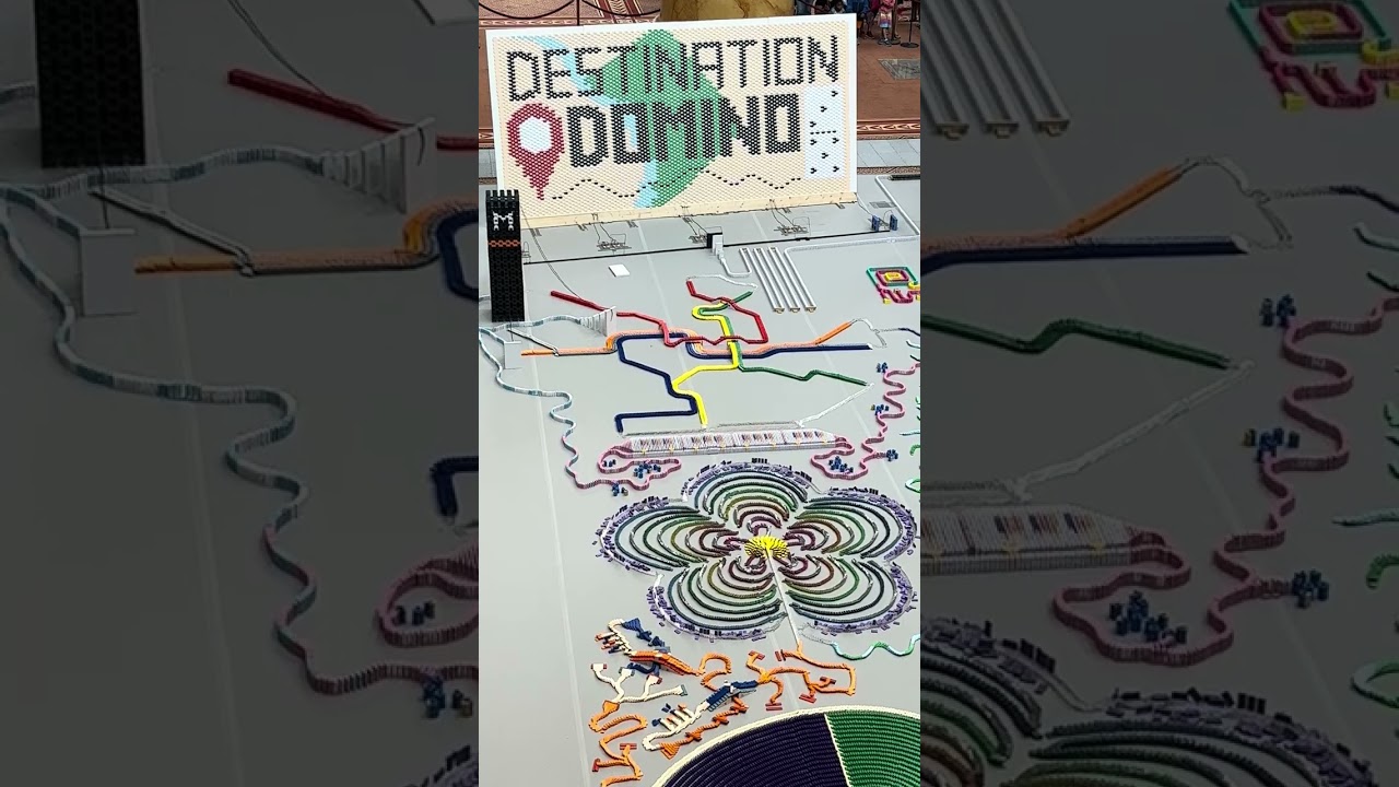 Over 100,000 Dominos Fall in the National Building Museum