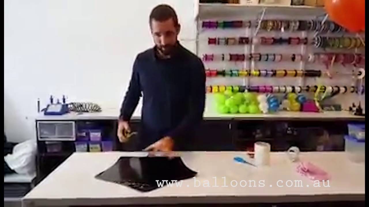 Vinyl transfer tips onto foil balloons