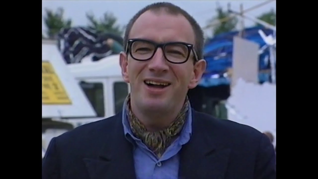 Simon Day's Tommy Cockles chatting at Glastonbury (C4, 1995)