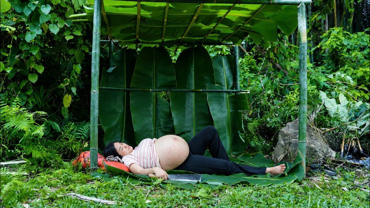 Pregnant homeless single mother starving and desperate&mdash;carrying her unborn child in the deep forest.