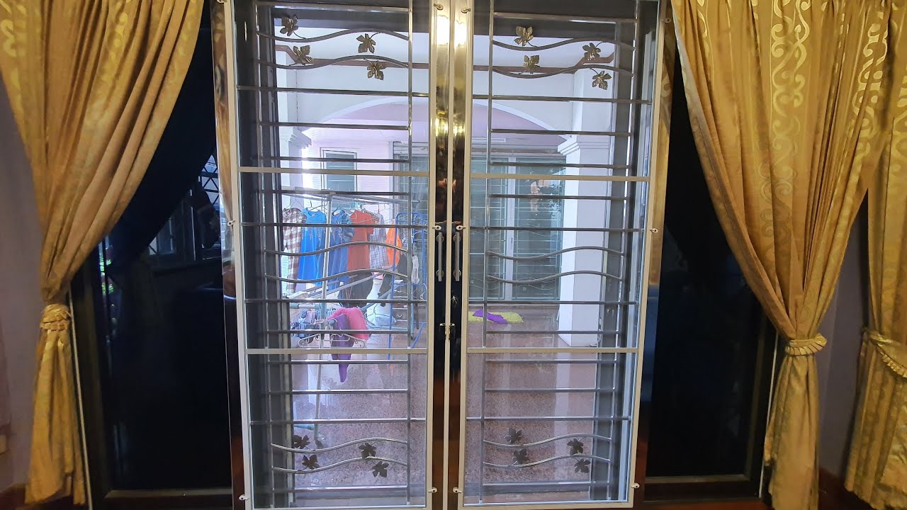 ประตูสแตนเลสดัดบานเลื่อนรางแขวนคู่