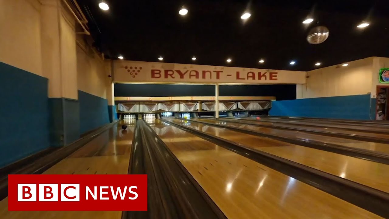 One-shot drone footage shows inside of US bowling alley - BBC News
