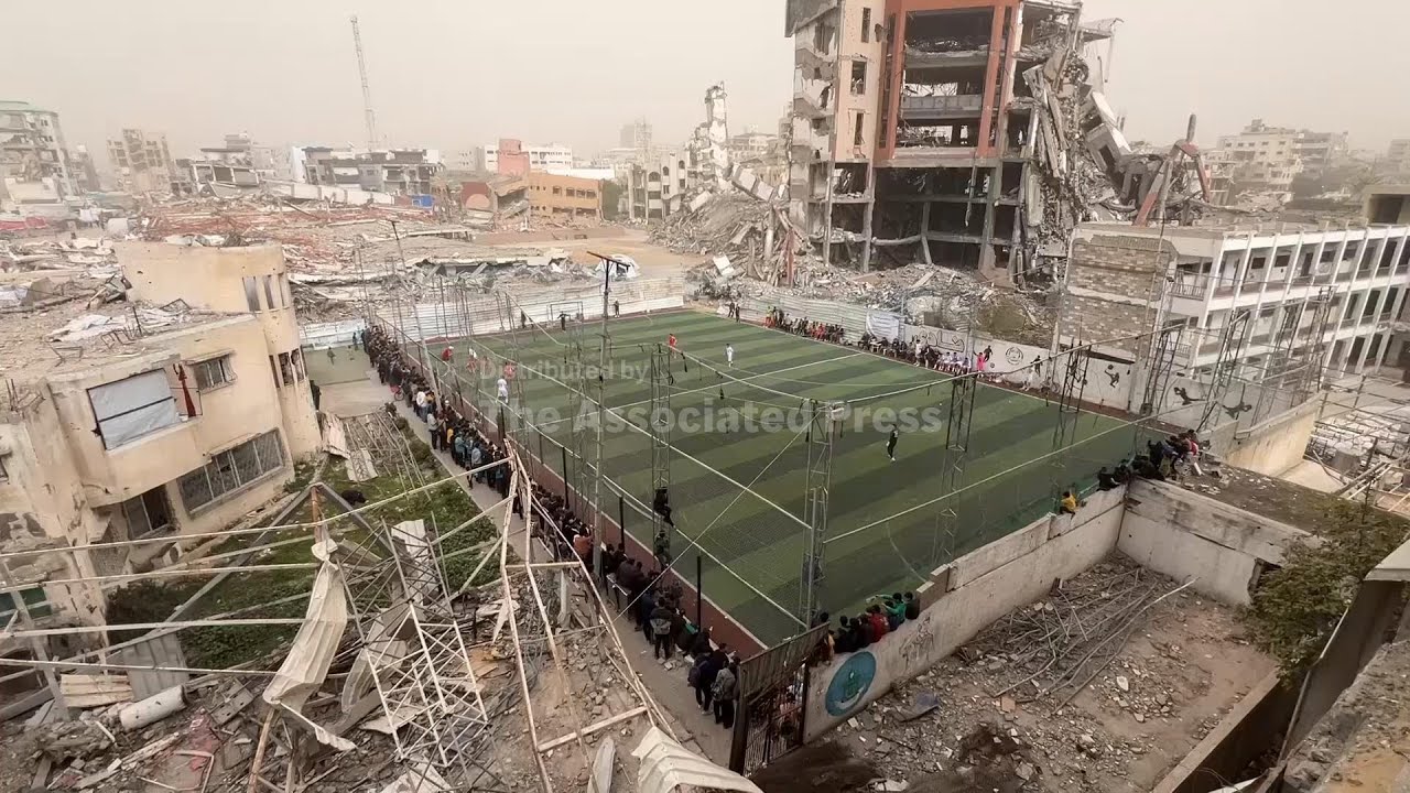 Gaza residents find joy in the beautiful game - on a soccer pitch surrounded by destruction